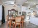 Elegant dining room featuring a large wood table, chandelier, and built-in hutch at 600 E Monbo Rd, Statesville, NC 28677