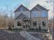 Two-story house with stone and siding exterior at 600 E Monbo Rd, Statesville, NC 28677