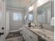 Modern bathroom with granite countertops and double vanity at 6211 Rock Island Rd, Charlotte, NC 28278