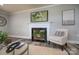 Modern fireplace with white mantel and black tile hearth at 6211 Rock Island Rd, Charlotte, NC 28278