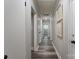 Bright hallway with updated flooring and stylish wall decor at 6211 Rock Island Rd, Charlotte, NC 28278