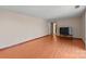 Bright bedroom with wood flooring and a TV stand at 6619 Wagon Oak Rd, Charlotte, NC 28212