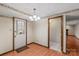 Bright entryway with wood flooring, leading to other rooms at 6619 Wagon Oak Rd, Charlotte, NC 28212