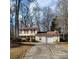 Two-story house with attached garage and long driveway at 6619 Wagon Oak Rd, Charlotte, NC 28212