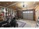 Garage with storage shelving and room for vehicles at 6619 Wagon Oak Rd, Charlotte, NC 28212