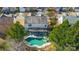 Aerial view of house with a backyard pool and patio at 7647 Black Hawk Ln, Tega Cay, SC 29708