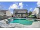 Relaxing in-ground pool with a pergola and patio furniture at 7647 Black Hawk Ln, Tega Cay, SC 29708