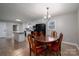 Kitchen with island, granite countertops, and dark appliances at 7704 Woodland Hills Rd, Hickory, NC 28602