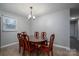 Dining area with wood table and chairs, view to kitchen at 7704 Woodland Hills Rd, Hickory, NC 28602