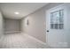 Laundry room with tiled floor and exterior access at 7704 Woodland Hills Rd, Hickory, NC 28602