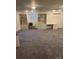 Finished basement with built-in shelving and carpeting at 904 Mascot Dr, Albemarle, NC 28001