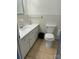 Clean bathroom with white tile and updated vanity at 904 Mascot Dr, Albemarle, NC 28001