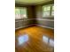 Well-lit bedroom with hardwood floors and neutral walls at 904 Mascot Dr, Albemarle, NC 28001