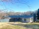 Rear view of house showing patio and solar panels at 904 Mascot Dr, Albemarle, NC 28001