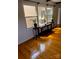 Living room with hardwood floors and large windows at 904 Mascot Dr, Albemarle, NC 28001