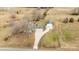 Aerial view of home with detached garage and long driveway at 9175 Cox Rd, Mount Pleasant, NC 28124