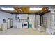 Basement laundry area with shower and water heater at 9175 Cox Rd, Mount Pleasant, NC 28124