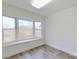 Simple bedroom with bay window and wood flooring at 9175 Cox Rd, Mount Pleasant, NC 28124