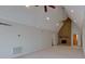 Large living room with vaulted ceilings and brick fireplace at 9175 Cox Rd, Mount Pleasant, NC 28124