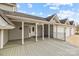 Covered front porch with white columns and entrance at 9175 Cox Rd, Mount Pleasant, NC 28124