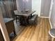 Bright dining room featuring a rustic wood table and bench seating at 9624 Langston Mill Rd, Charlotte, NC 28216