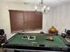 Game room with a pool table and large windows at 9624 Langston Mill Rd, Charlotte, NC 28216