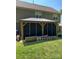 View of a screen-enclosed gazebo in the backyard, creating an inviting outdoor space at 9624 Langston Mill Rd, Charlotte, NC 28216