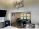 The recreation room features hardwood floors, a modern light fixture, and a pool table at 9624 Langston Mill Rd, Charlotte, NC 28216