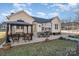 Patio area with gazebo, seating, and covered parking at 101 Ingonish Dr, Gastonia, NC 28056