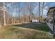 Large backyard with shed and wooded area at 101 Ingonish Dr, Gastonia, NC 28056