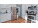 Modern kitchen features stainless steel appliances and white cabinetry at 101 Ingonish Dr, Gastonia, NC 28056