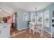 Bright kitchen with white cabinets, breakfast nook, and a bay window at 101 Ingonish Dr, Gastonia, NC 28056