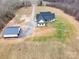 Aerial view of a property showcasing a house and detached garage at 1026 Walker Branch Rd, Lincolnton, NC 28092