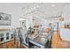 Bright dining room with farmhouse table and kitchen views at 1026 Walker Branch Rd, Lincolnton, NC 28092