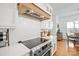 Modern kitchen with stainless steel appliances and white cabinetry at 1026 Walker Branch Rd, Lincolnton, NC 28092