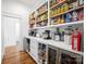 Well-organized pantry with ample storage shelving at 1026 Walker Branch Rd, Lincolnton, NC 28092