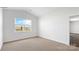 Bright bedroom with carpeted floor and large window at 1058 Horizon Ave, Chester, SC 29706