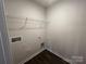 Utility room with dark floors and wire shelf at 1058 Horizon Ave, Chester, SC 29706