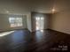 The light and bright Living Room features a sliding door to the outside and large windows at 1058 Horizon Ave, Chester, SC 29706