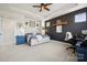 Bright bedroom featuring a cozy bed, ample natural light, and a workspace at 1248 Thomas Knapp Pkwy, Fort Mill, SC 29715