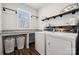 Laundry room with washer, dryer, shelving, and granite countertop at 1248 Thomas Knapp Pkwy, Fort Mill, SC 29715