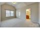 Bedroom with en-suite bathroom and window with blinds at 1257 Stacey Ln, Indian Land, SC 29707