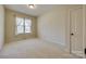 Well-lit bedroom with hardwood floors and neutral wall colors at 1257 Stacey Ln, Indian Land, SC 29707