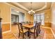 Elegant dining room with hardwood floors and chandelier at 1257 Stacey Ln, Indian Land, SC 29707