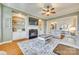 Gathering room with fireplace, built-ins, and hardwood floors at 1257 Stacey Ln, Indian Land, SC 29707