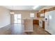 Kitchen with wood cabinets, white appliances, and breakfast bar at 13441 Calloway Glen Dr, Charlotte, NC 28273