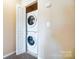 Laundry closet with stacked washer and dryer at 13441 Calloway Glen Dr, Charlotte, NC 28273