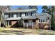 Two-story brick and gray sided home with a covered entry at 1364 5Th Street Nw Cir, Hickory, NC 28601