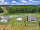 Aerial view of house and surrounding homes at 179 Tanner Loop, Troutman, NC 28166