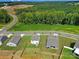 Aerial view of house and neighborhood at 179 Tanner Loop, Troutman, NC 28166